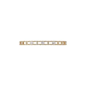 Elegant 18k gold plated bracelet with oval cubic zirconia stones in minimalist design.