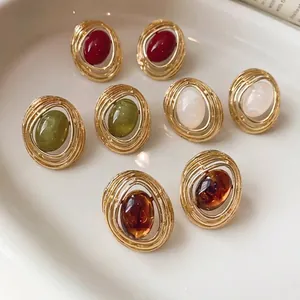 Elegante Vintage-Ohrringe aus Harz mit goldenem offenem Rahmen in vier Farben