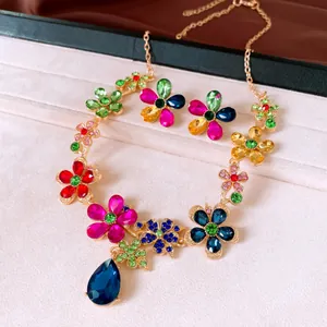 Detailed view of colorful rhinestone flower necklace and earring jewelry set