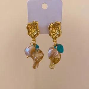 Vintage gold stud earrings with organic resin twist and turquoise accents