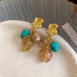 Vintage stone leaf tassel earrings with gold-tone finish in Maillard style aesthetic