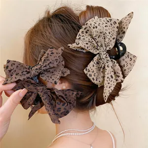 Pinzas para el pelo vintage con lazo de tela de leopardo para peinados elegantes
