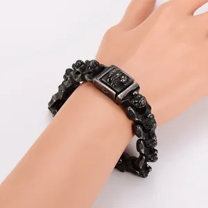 Detailed view of punk stainless steel lion head bracelet with vintage finish for men