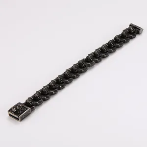 Detailed view of punk style stainless steel bracelet with vintage lion head links