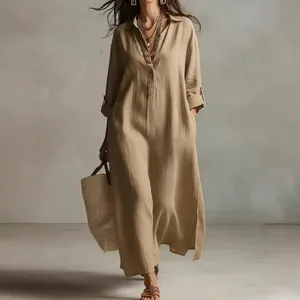 Elegant khaki linen maxi shirt dress with long sleeves and side slits for summer fashion.