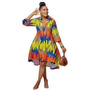 Full view of colorful African print shirt dress with deep V-neck and high-low hem