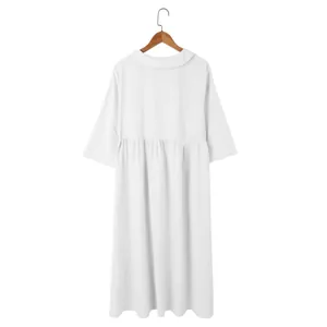 Elegant back view of a white casual cotton linen loose dress displayed on a wooden hanger