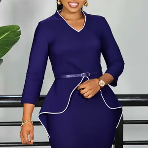 Elegant navy blue professional pencil dress featuring white-trimmed ruffle details