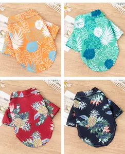 Grid layout showing four colorful Hawaiian print dog shirts in various tropical floral patterns.