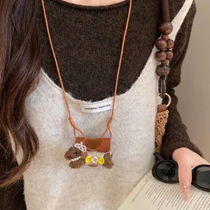 Collier en cuir de style bohème avec un charmant porte-lunettes en forme de chien