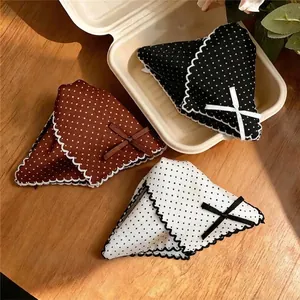 Elegant polka dot triangle hair claw clips with lace edge and ribbon bow detail.