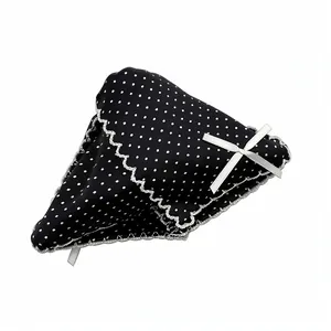 Elegant black polka dot triangle hair claw clip with white lace and bow detail