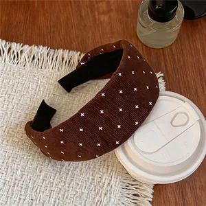 Elegant Korean style brown corduroy wide headband featuring white cross pattern prints