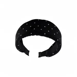 Elegant black padded headband with white star print pattern for women