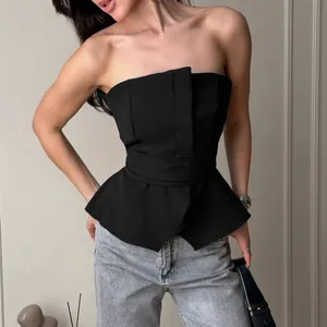 Elegant black strapless peplum corset top featuring a structured waist-cinching silhouette