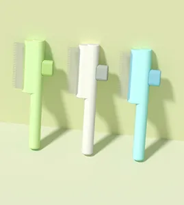 Detailed view of self-cleaning pet grooming brushes in three different pastel colors