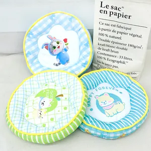 Comfortable circular cooling pet mat for cats and dogs featuring cute cartoon prints