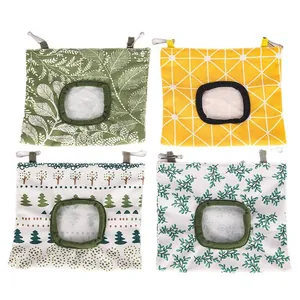 Hanging hay bags for rabbits and guinea pigs featuring four colorful decorative patterns