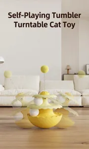 Interactive cat tumbler turntable toy with fuzzy balls in minimalist living room