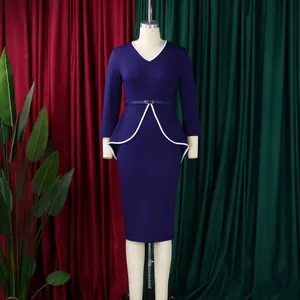 Elegant navy blue V-neck long sleeve pencil dress with white piping and peplum detail