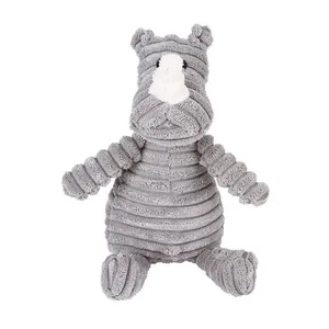 Dettaglio di un giocattolo per cani a forma di rinoceronte in velluto a coste grigio.