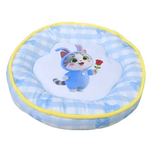 Comfortable round pet cooling bed with blue plaid pattern and cute bunny cat cartoon design