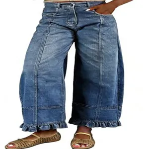 Detailed view of Y2K retro loose denim pants with ruffle hem and front seam details