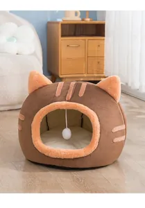 Cozy semi-enclosed cat bed shaped like a brown cat head with plush interior