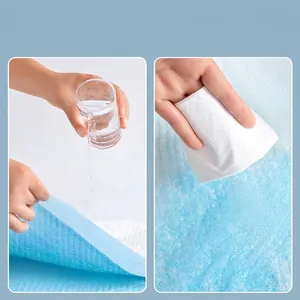 Absorbent thickened pet pee pad showing strong water locking and leak-proof surface