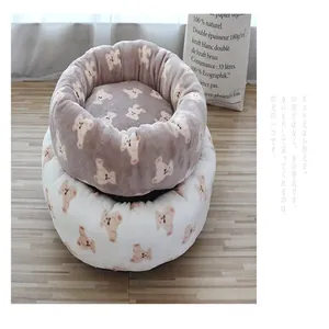 Close-up of warm plush pet beds with cute teddy bear patterns for cats and small dogs