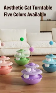 Detailed view of colorful multi-layer cat turntable toys with spring plush balls.
