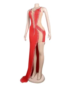 Full length view of a red sexy rhinestone mesh evening gown displayed on a mannequin