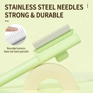 Green self-cleaning pet grooming comb with durable stainless steel needles for cats and dogs.