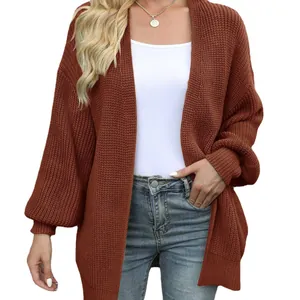 Dames grofgebreid vest in baksteenrood met oversized lantaarnmouwen en open voorkant