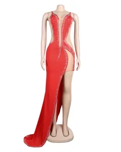 Detailed view of red sexy sheer mesh formal dress with rhinestones and high slit