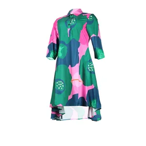 Detailed view of a colorful abstract floral pattern dress featuring a high-low hemline