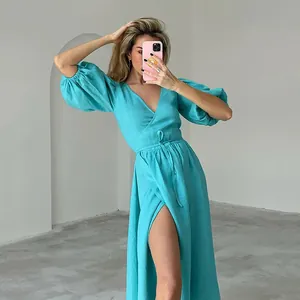 Elegant turquoise puff sleeve wrap maxi dress with a sexy side slit detail for women