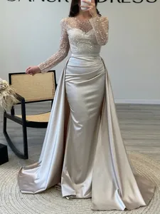 Elegant French champagne satin mermaid evening dress with sequined bodice and long sleeves