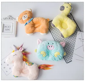 Detail view of various cartoon animal pet pillows with cute bear and unicorn shapes