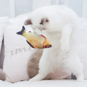 Realistic plush catnip fish toy for cats shown in interactive play and biting detail