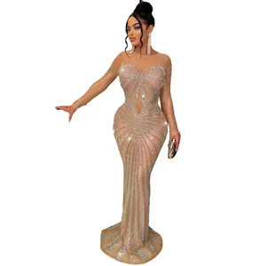 Detailed view of shimmering rhinestone patterns on a sexy bodycon floor-length evening gown.