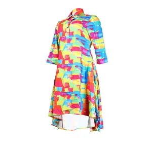Detailed shot of a colorful abstract print dress with a stylish high-low hemline.