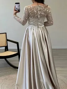 Elegant French style rose gold formal evening dress featuring sequin bodice and satin skirt