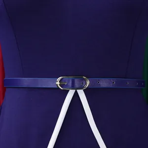 Close-up of navy professional dress with thin belt and white piping detail