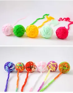 Pelotas de hilo de felpa de colores con colas para que los gatos jueguen