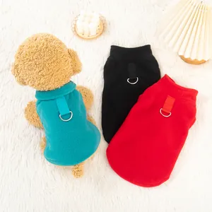 Warm polar fleece dog vest with harness D-ring available in teal, black, and red colors