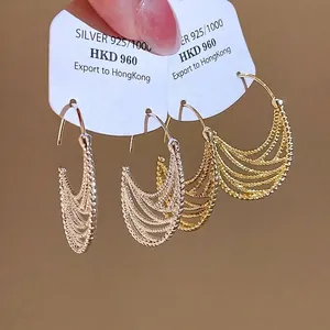 Eleganti orecchini a cerchio vintage a mezzaluna in finiture oro e argento lucido