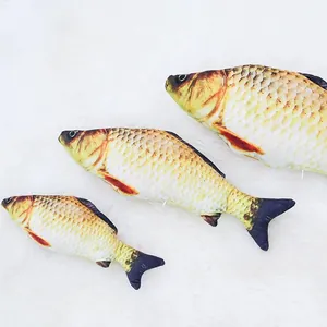Close-up showing three different sizes of realistic plush catnip fish toys for cats