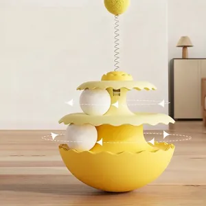 Jouet culbuto jaune pour chat avec balles rotatives et pompon sur ressort