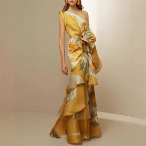 Elegant one-shoulder yellow floral maxi dress with 3D flower detail and tiered ruffles